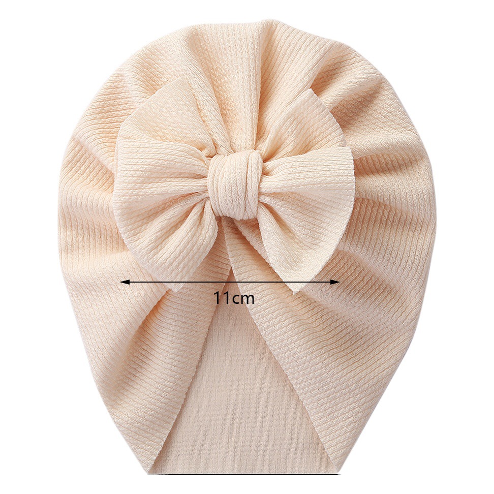 O1CN01LzC7bd1Bs2utpFD8O_0-0-cib European and American New Baby Pure Color Pullover Hat with Bow Kidsren's Spring & Fall Indian Hat Snake Pattern Baby Boundless Hat - Image 1