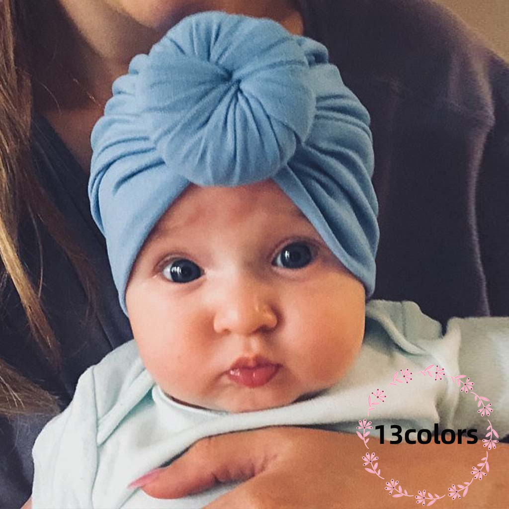 O1CN01mgYRaA2Hq7GFg9Py8_2208265699201-0-cib-1 New European and American Baby Pullover Hat, Cute Pure Color Donut Kidsren's Hat, Summer Thin Baby Fetal Cap - Image 1